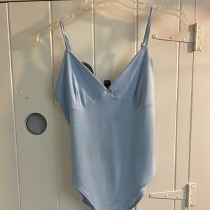 Light blue body suit